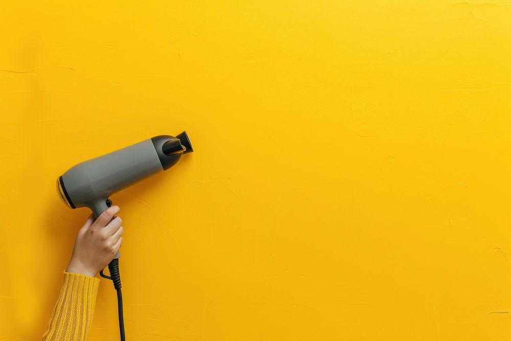 Person holding hair dryer hand | Premium Photo - rawpixel