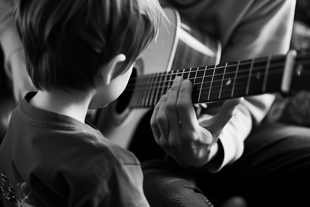 Teaching a guitar musician finger person.