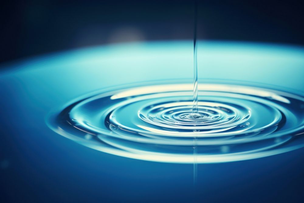 Water drop ripple blue concentric.