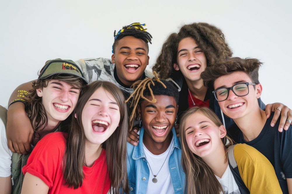 Multiracial group of young people standing in front laughing portrait youth.