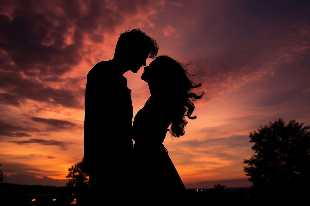 Couple silhouette sky backlighting outdoors.