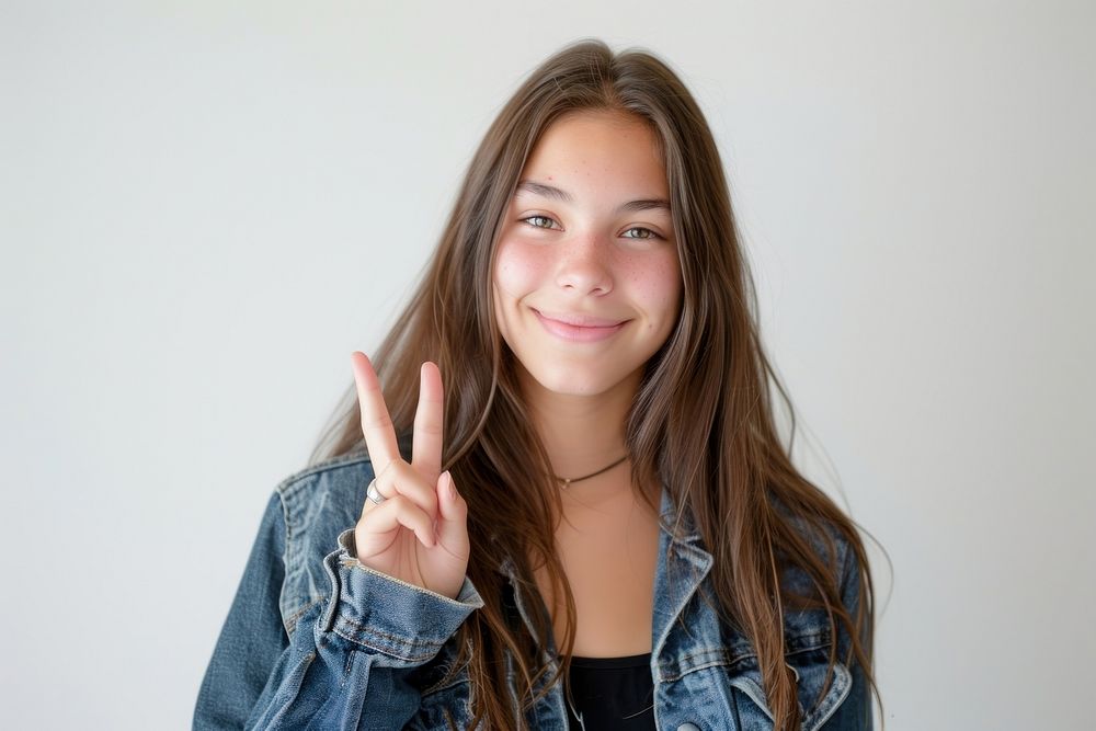 Teenager portrait smile finger.