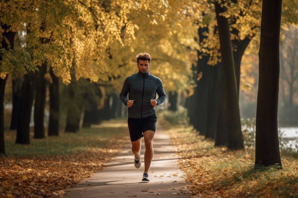 Man running autumn morning jogging.