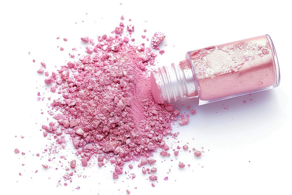 Pink Powder and rose gold powder cosmetics white background splattered.