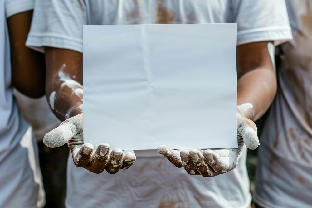 Volunteering wearing blank white hand midsection beekeeper.