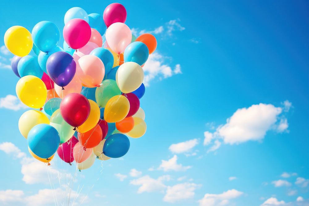 Balloons floating in the sky backgrounds blue anniversary.