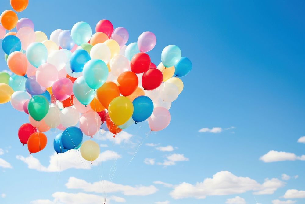 Balloons floating in the sky backgrounds blue celebration.