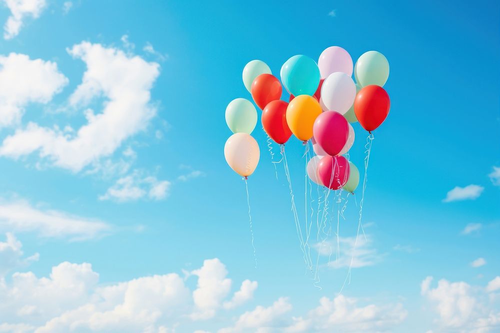Balloons floating in the sky blue tranquility anniversary.