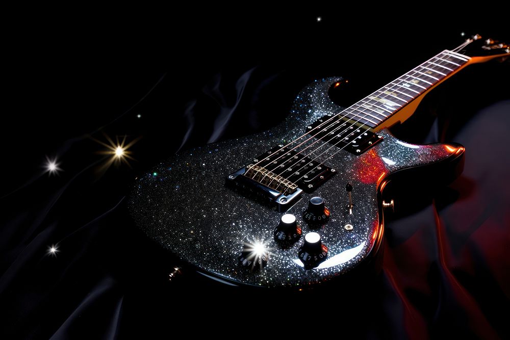 Guitar black black background illuminated.