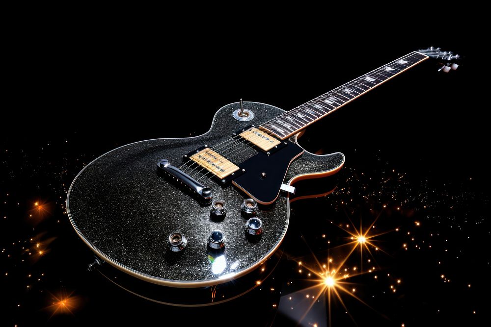 Guitar black black background illuminated.