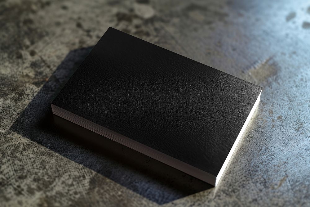 Black notebook on floor
