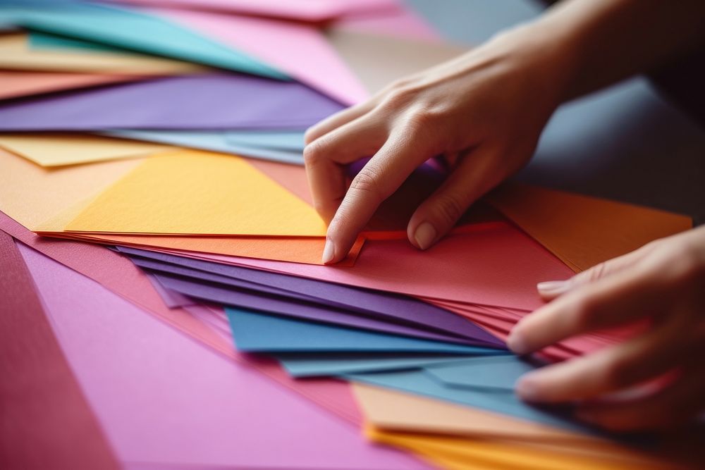 Hand making colorful craft paper art creativity origami.