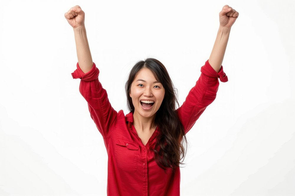 Excited Asian woman raised her hands up adult white background achievement.