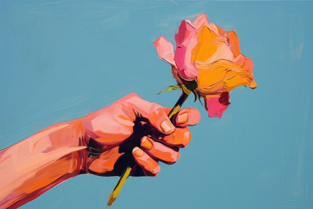 Hand with flower painting plant rose.
