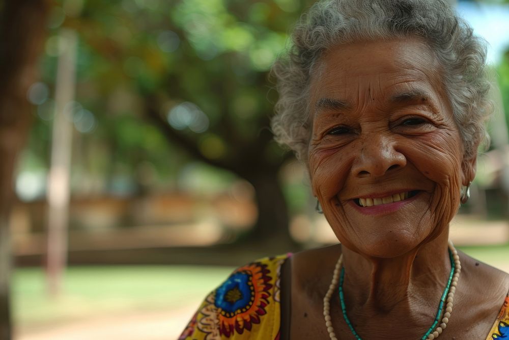 Brazilian senior woman smiling necklace portrait jewelry.