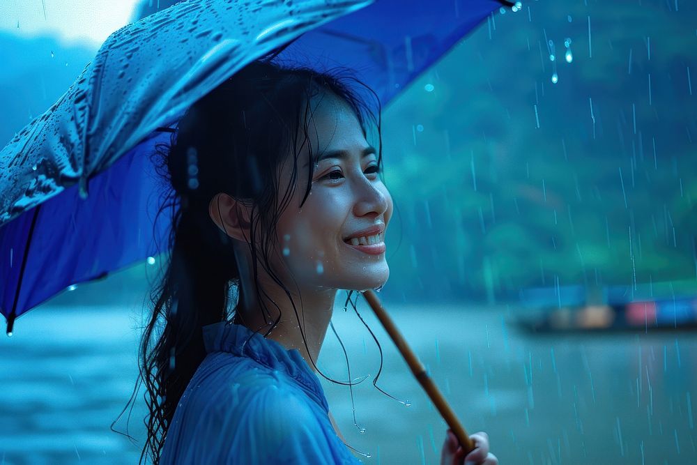 Thai woman happy rain day happiness.
