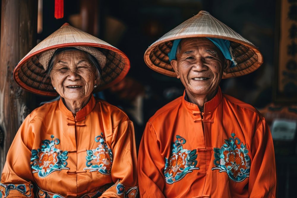 Vietnamese elderly couple laughing female person.
