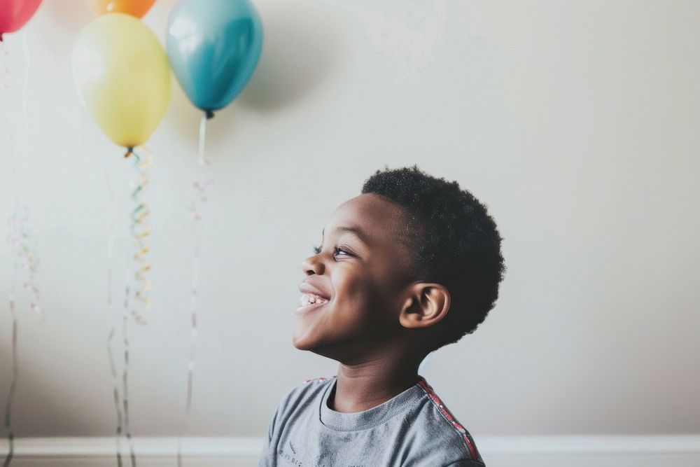 African American a boy smile face balloon.