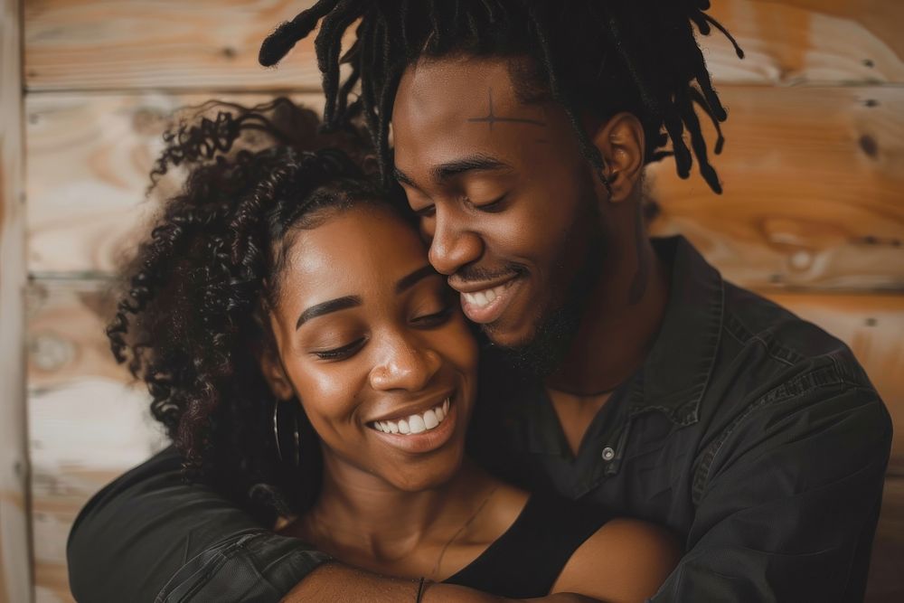 Black couple hugging accessories accessory laughing.