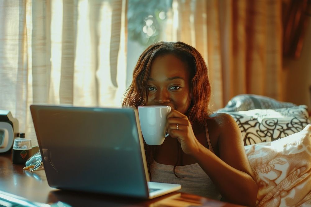 Working American African woman laptop electronics.
