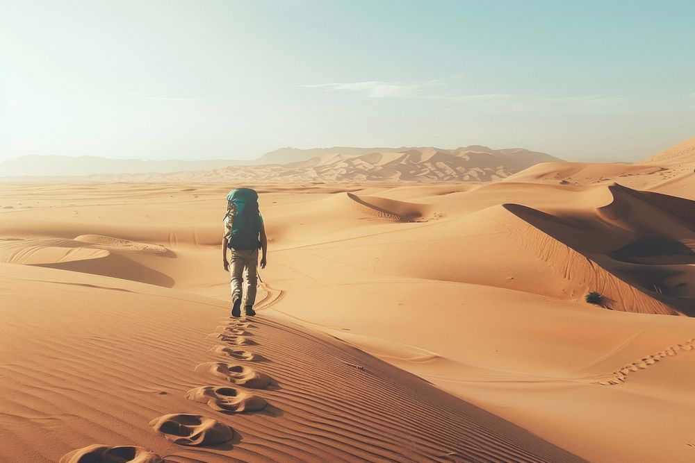 Person traveling person desert backpacking.