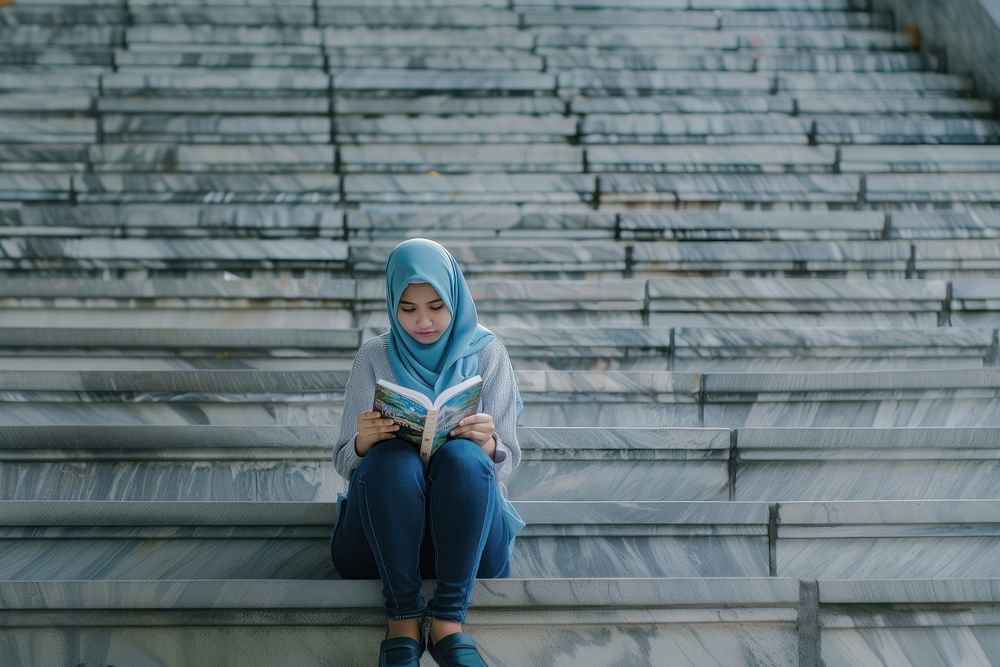 Teenager Indonesian woman reading sitting person female.
