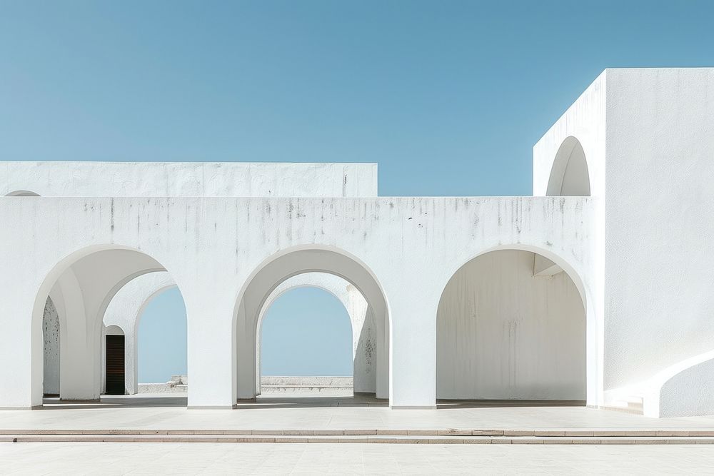 Liminal white building with arches architecture housing arched.