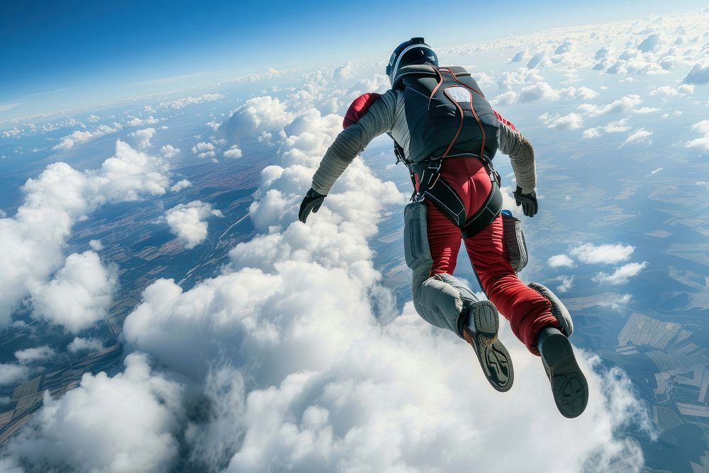 Parachutist skydiving adventure helmet cloud.