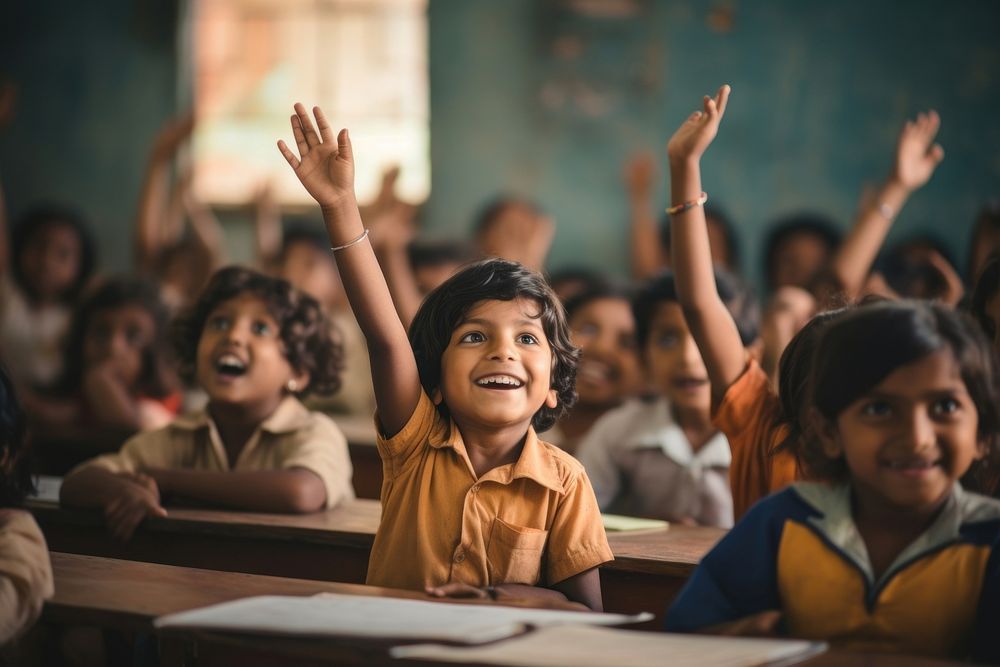 South Asian kids hands up in the classroom happy architecture accessories.