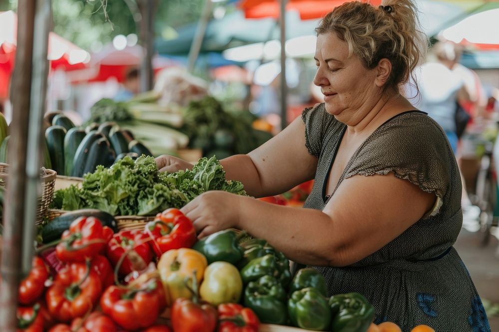 Chubby woman buy fresh vegetables at farmer market outdoors adult plant.