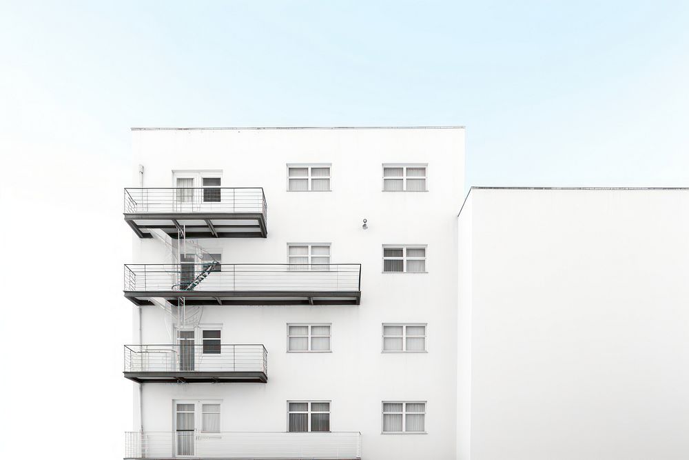 White minimal fire escape of hotel architecture building city.