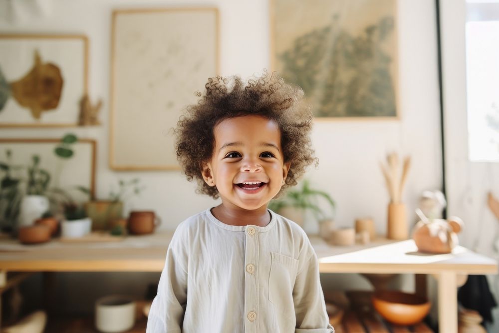 A happy african american toddler at home smile child baby.