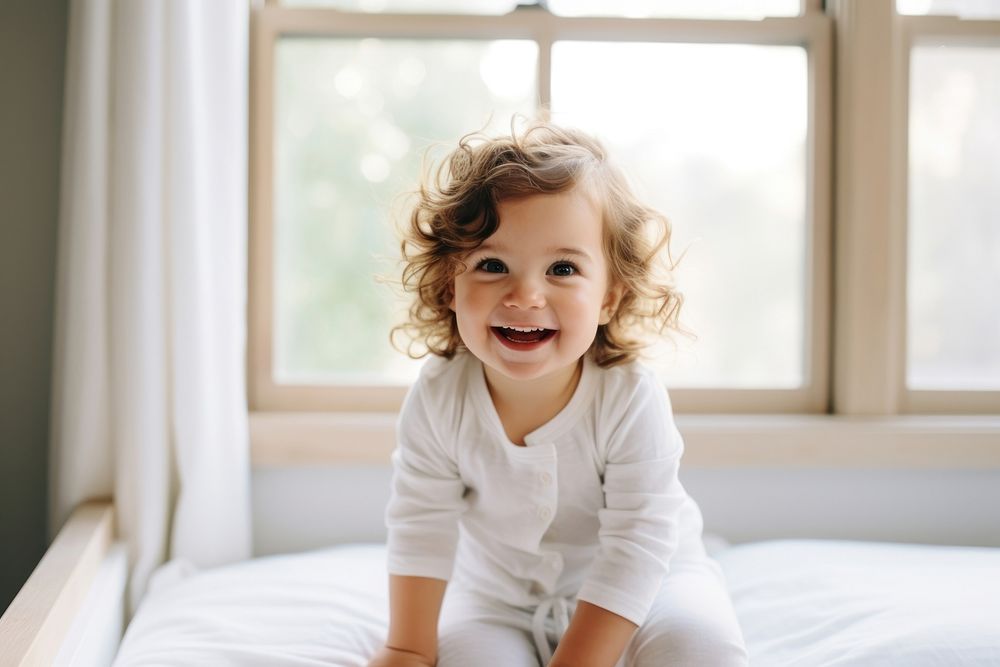Happy toddler at home smile white baby.