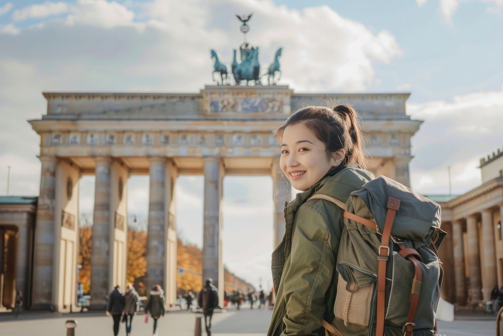 Asian woman travel to Germany at Brandenburg Gate landmark gate brandenburg gate.