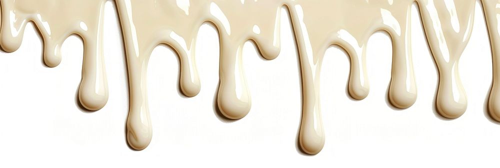 Dripping white chocolate backgrounds icing milk.