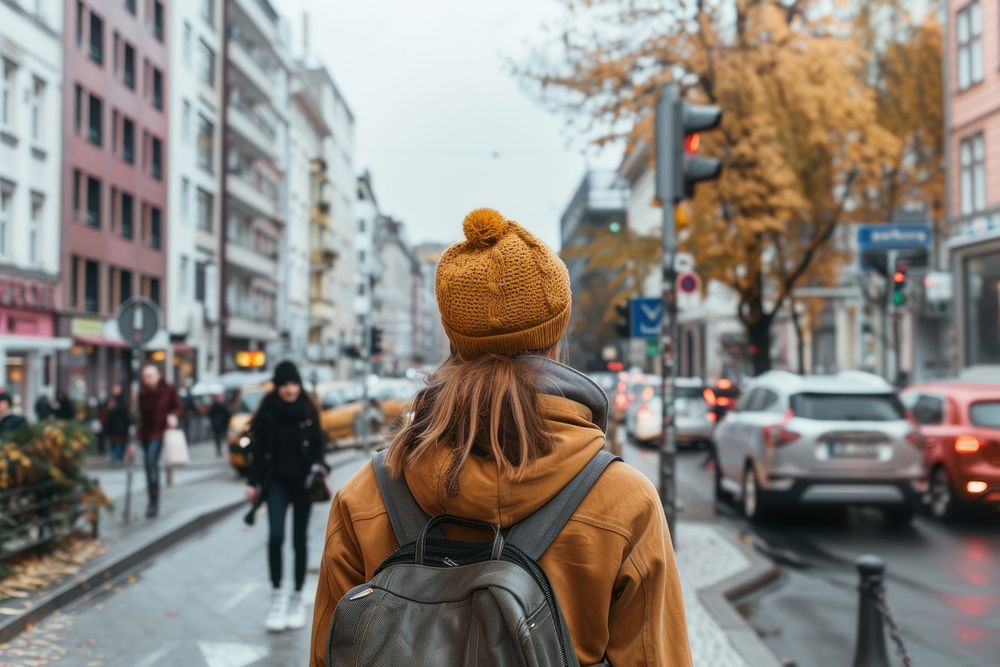 Woman travel at Berlin street adult light coat.