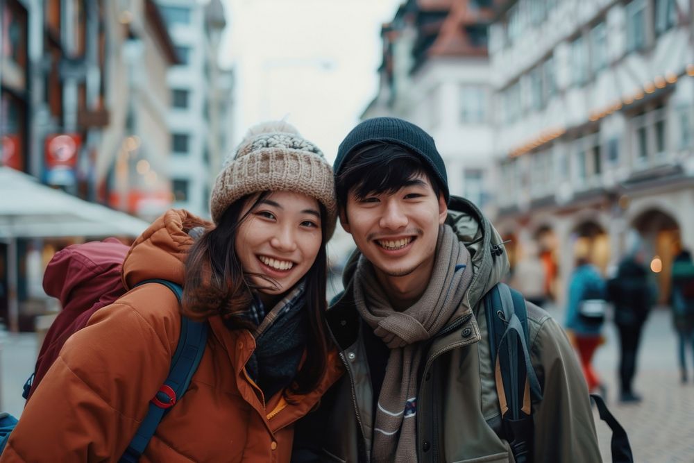 2 asian friends travel Marienplatz adult photo coat.
