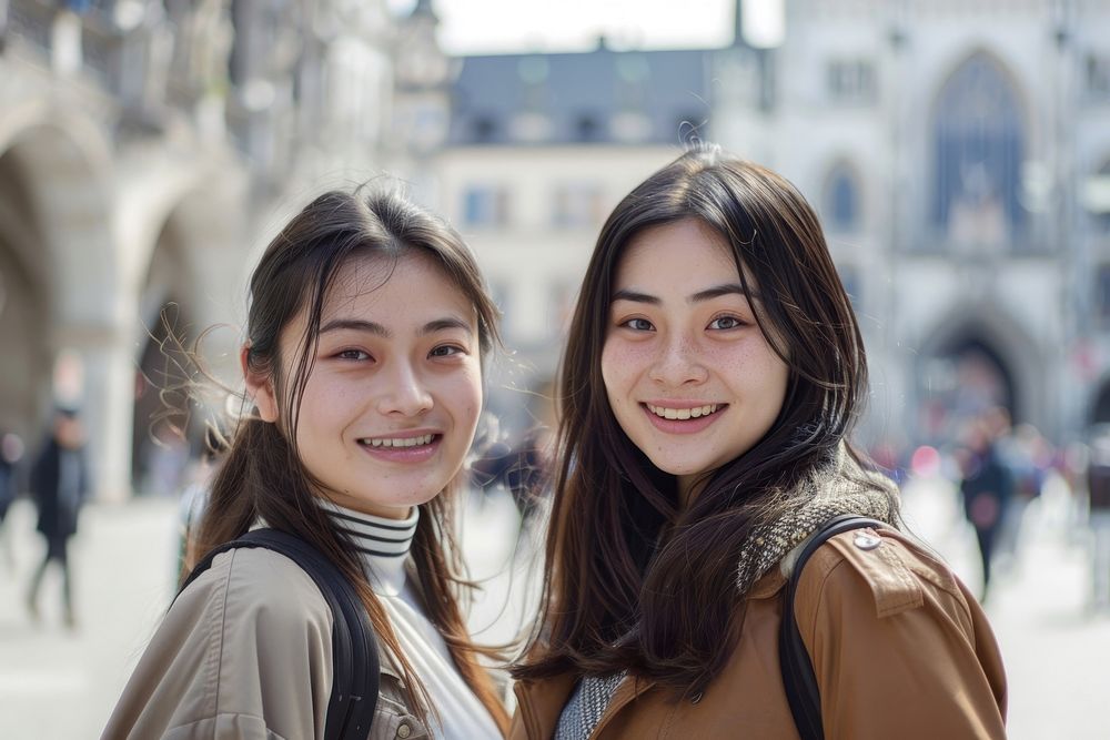 2 asian friends travel Marienplatz portrait selfie adult.