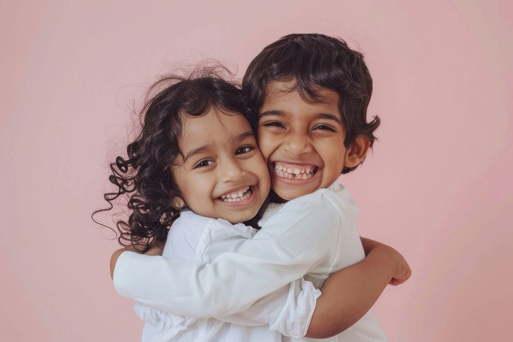 2 south asian kids hugging laughing photo photography.