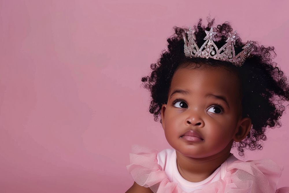 African american girl toddler wear a crown portrait tiara photo.