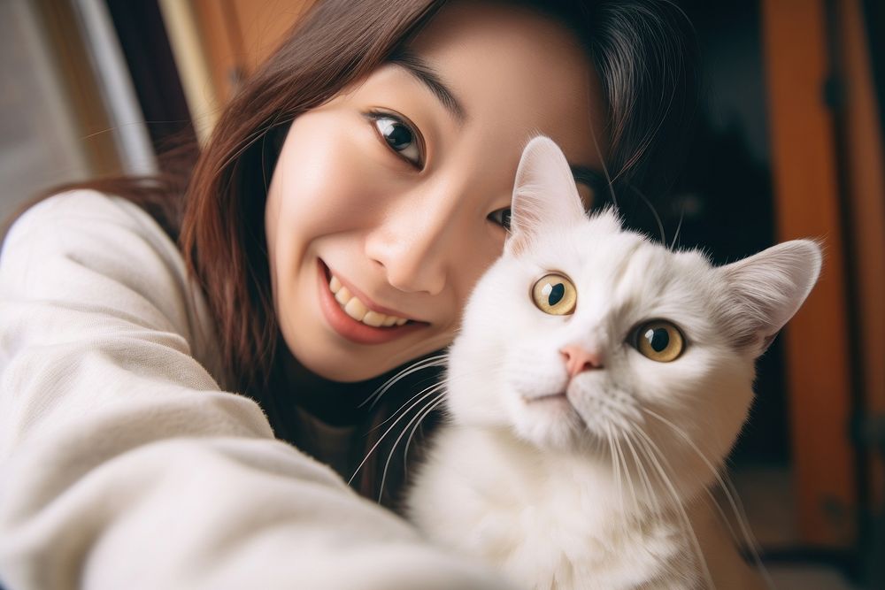 East Asian mature selfie photo cat.