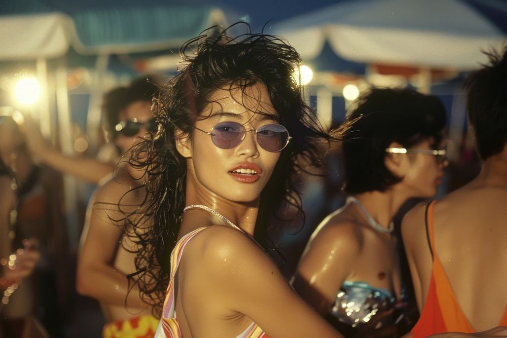 Thai woman dancing at full moon party accessories photography sunglasses.