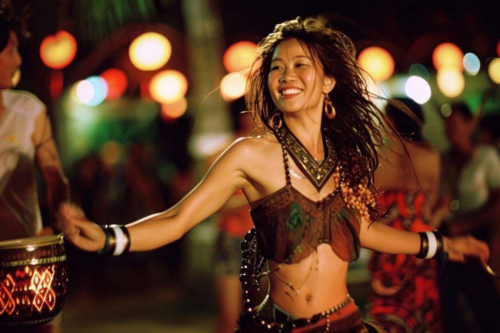Thai woman dancing at full moon party accessories recreation performer.