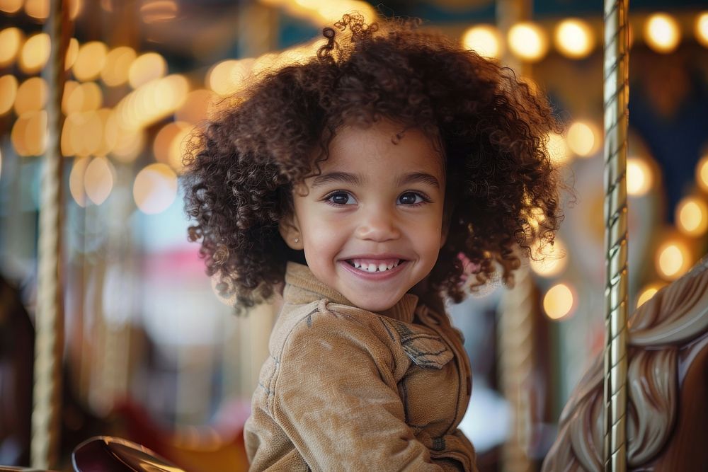 A mixed race child with curly hair smiles photography portrait clothing.