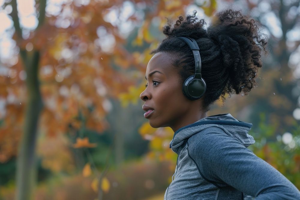 Woman running electronics headphones headset.