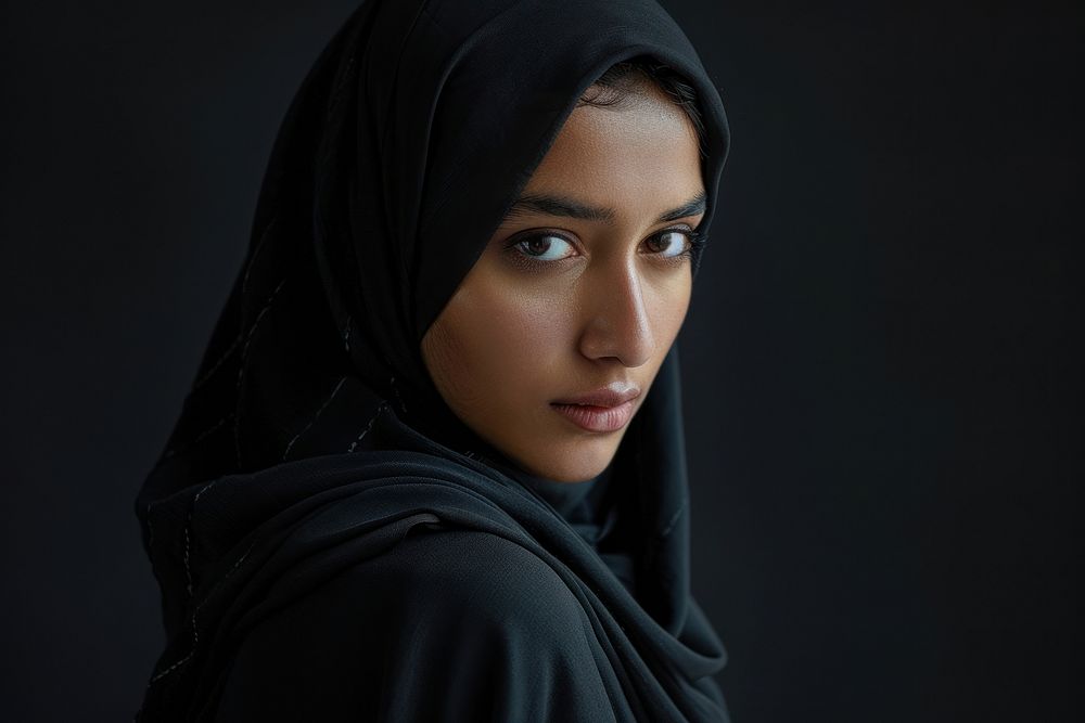 Muslim woman wearing the black hijab photo photography portrait.