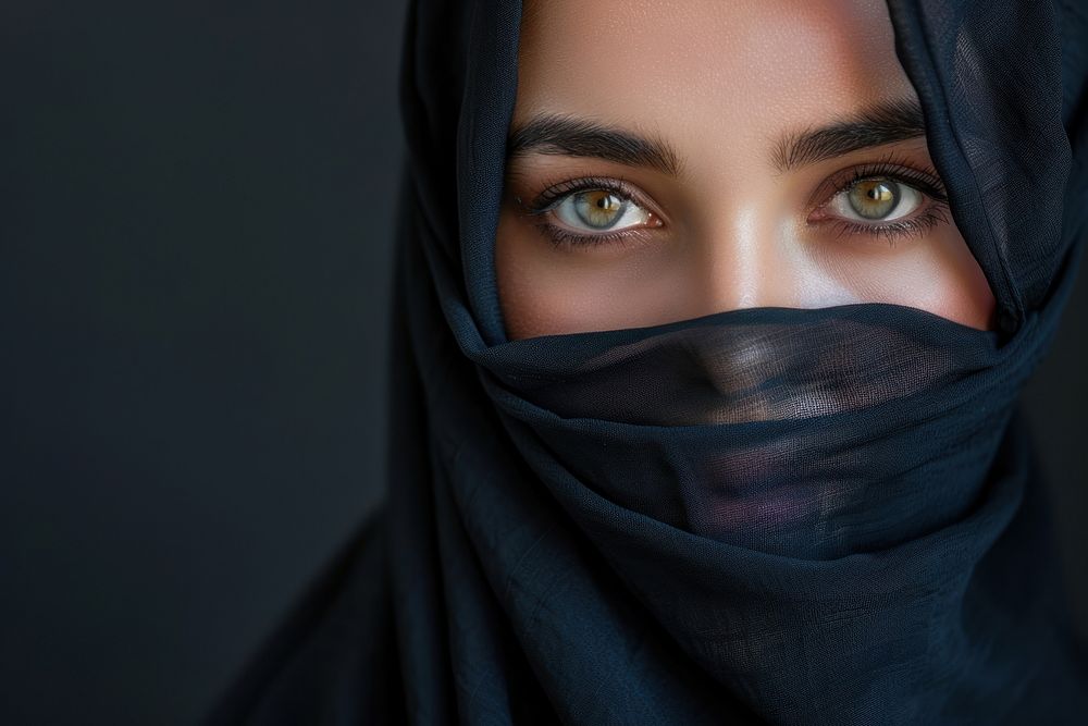 Muslim woman wearing the black hijab photo photography clothing.