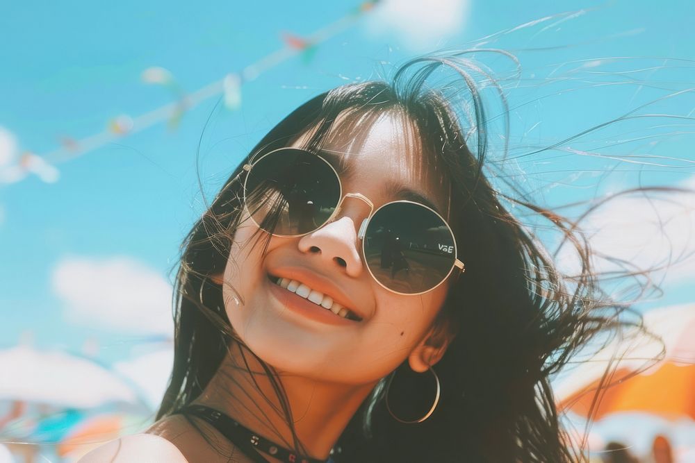 Thai woman happy accessories sunglasses.