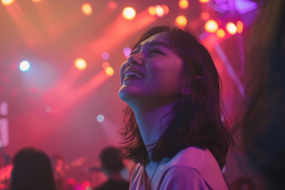Happy Thai woman Watching concert accessories accessory lighting.