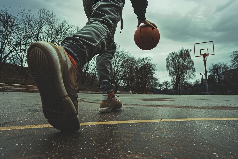 Person playing basketball clothing footwear apparel.